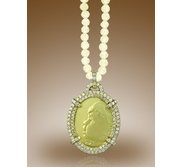 Oval Shaped Framed Pendant w  1 CT  In Diamonds